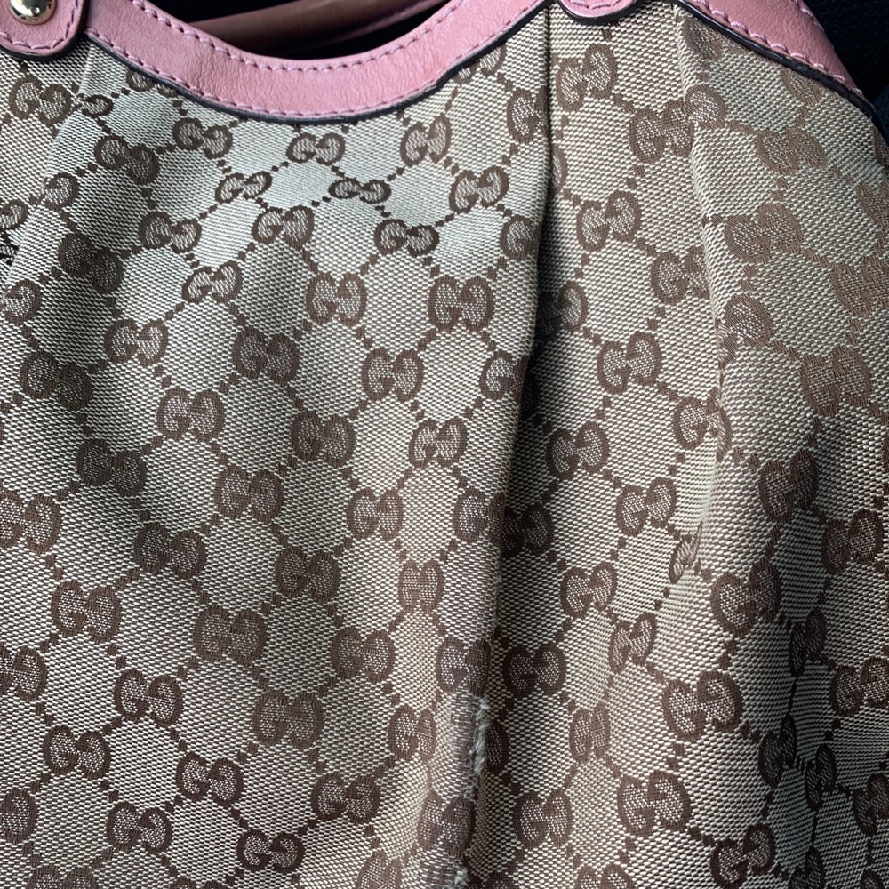 Gucci bag with tags available and duster What goes around comes around
